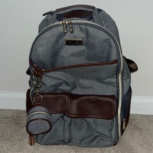 Itzy Ritzy Diaper Bag with stroller hangers, pacifier holder and changing pad.